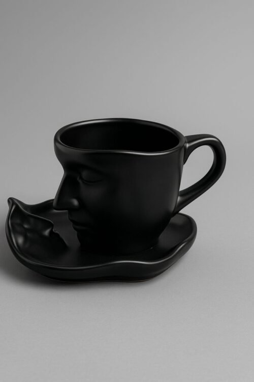 Matte Black Face-Sculpted Ceramic Mug with Artistic Saucer