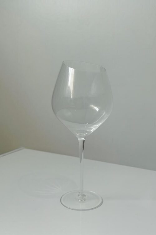 Elegant wine glass features a modern